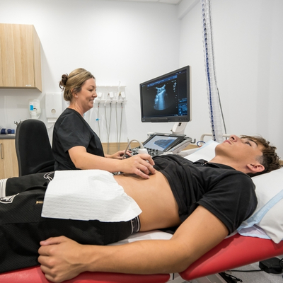Sonographer doing an ultrasound at Imaging Queensland